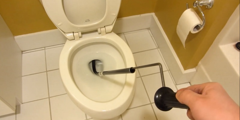 Using a Toilet Auger for unclog a toilet